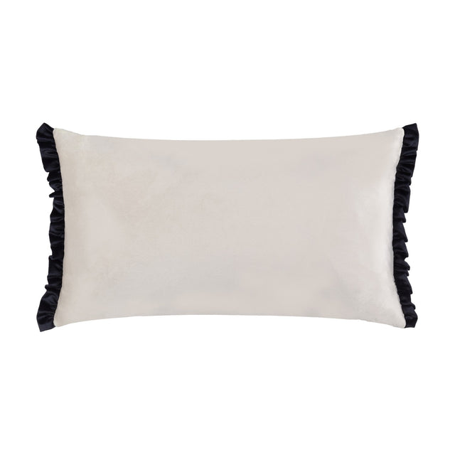 Tilly Plain Velvet Cushion in lace-cream velvet with a black frilled edge on the shorter sides, rectangular bolster shape on a plain white background.
