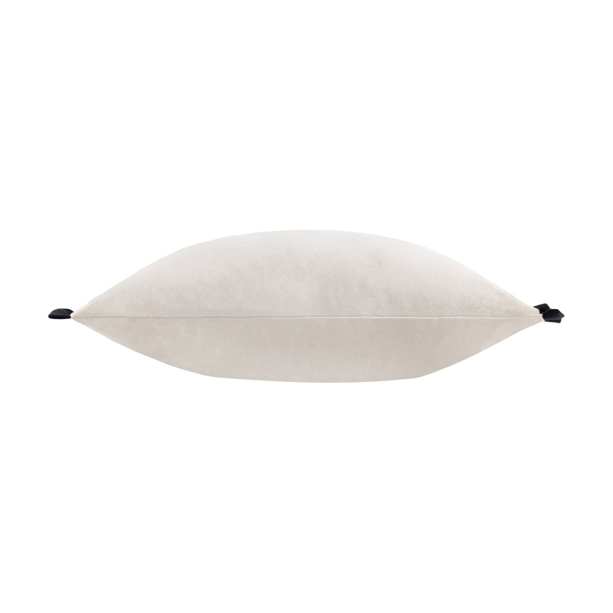 Tilly Plain Velvet Cushion in lace-cream velvet with black frilled corner ties, long bolster shape, shown side-on against a white background.