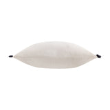 Tilly Plain Velvet Cushion in lace-cream velvet with black frilled corner ties, long bolster shape, shown side-on against a white background.