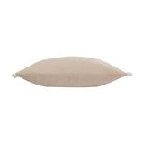 Side view of the Tilly Reversible Velvet Cushion in Oyster, showing its long lumbar shape with pale corner ties, set against a plain white background.