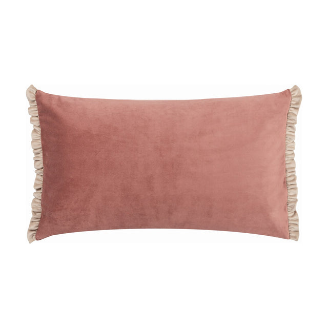 Tilly reversible velvet cushion in dusty pink with cream ruffled trim along the short edges, rectangular bolster shape, shown on a plain white background.