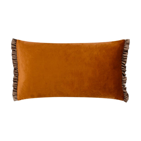 Tilly Reversible Velvet Cushion in rust-orange velvet with a frilled taupe side edge, rectangular shape, shown on a plain white background.