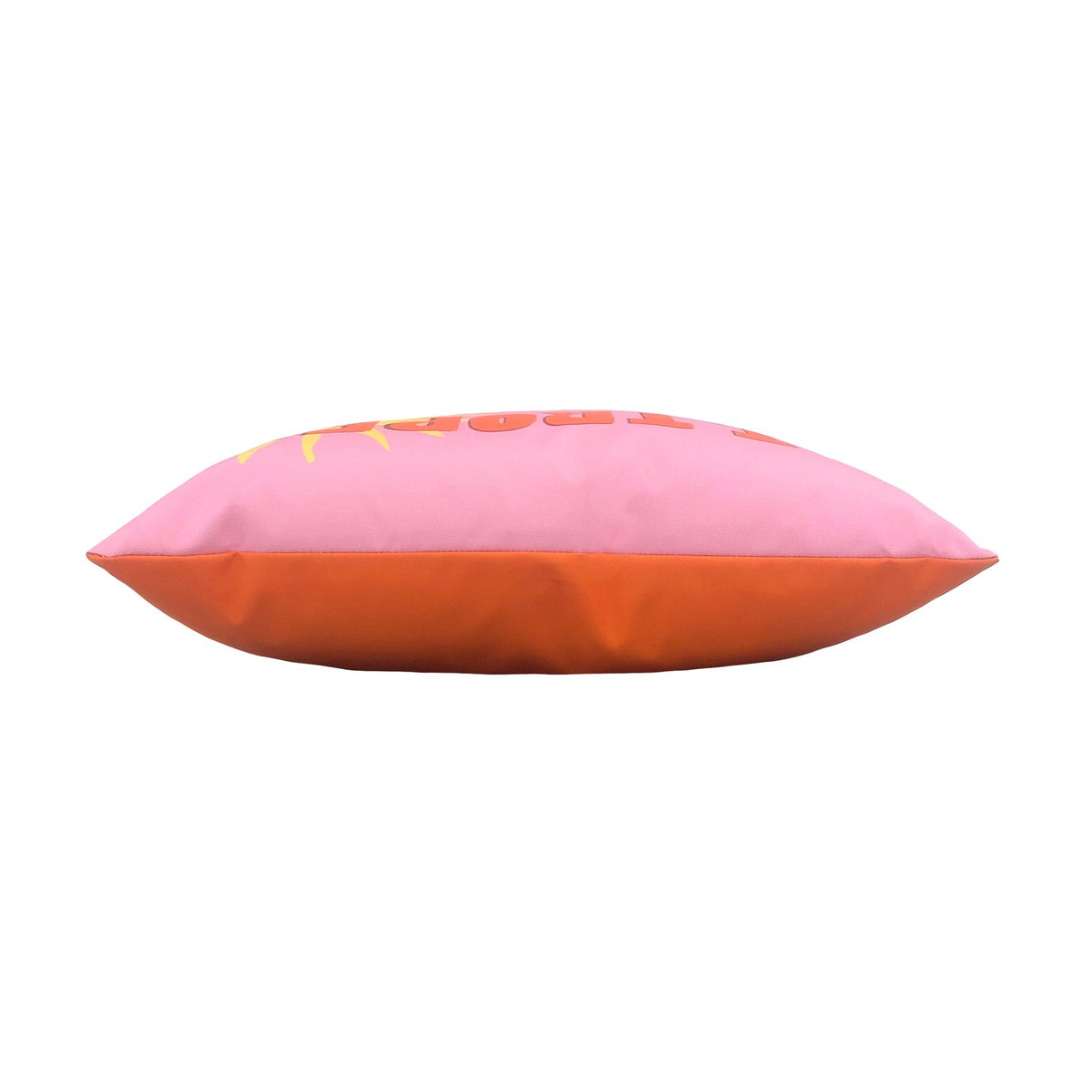 Side view of the Tropez Abstract polyester outdoor cushion, showing a pink top panel with orange lettering and a solid orange side gusset, on a plain white background.