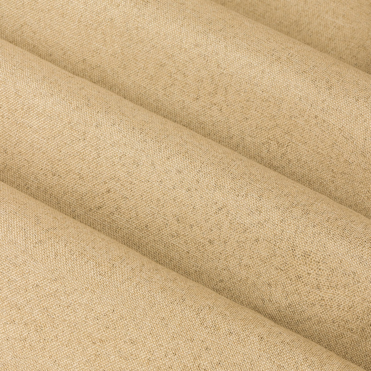 Close-up of soft yellow blackout eyelet curtain fabric, showing a plain woven polyester texture with gentle folds.