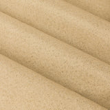 Close-up of soft yellow blackout eyelet curtain fabric, showing a plain woven polyester texture with gentle folds.