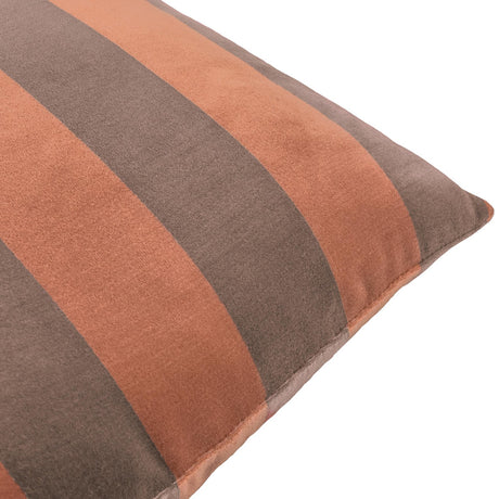 Close-up of The Ultimate Stripe Jacquard Velvet Cushion in Chocolate Caramel, showing woven caramel-brown and deep chocolate stripes with a soft velvet pile and piped edge, against a white background.