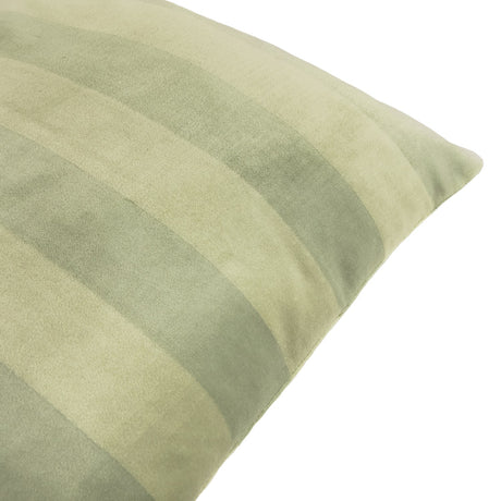 Close-up of The Ultimate Stripe Jacquard Velvet Cushion in Matcha Latte, showing woven tone-on-tone green stripes on soft velvet with a piped edge, set against a white background.