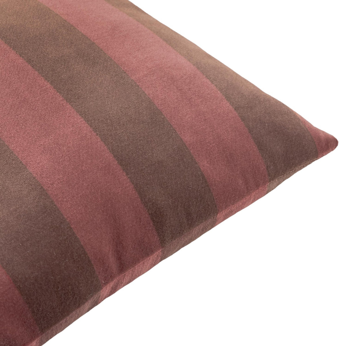 Close-up of The Ultimate Stripe Jacquard Velvet Cushion in red velvet, showing bold vertical stripes in dusky rose and deep cocoa brown with a piped edge, on a white background.