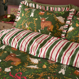 Green Twelve Days Frill Cotton Striped Duvet Cover Set, reversible with a Christmas highland cow and goose print on one side and a striped reverse, with a ruffled pillowcase.