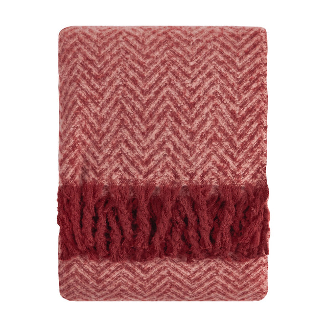 Tweedie Herringbone Polyester Throw folded flat, showing pink and burgundy chevron weave with a burgundy tasselled fringe on each end, set against a plain white background.