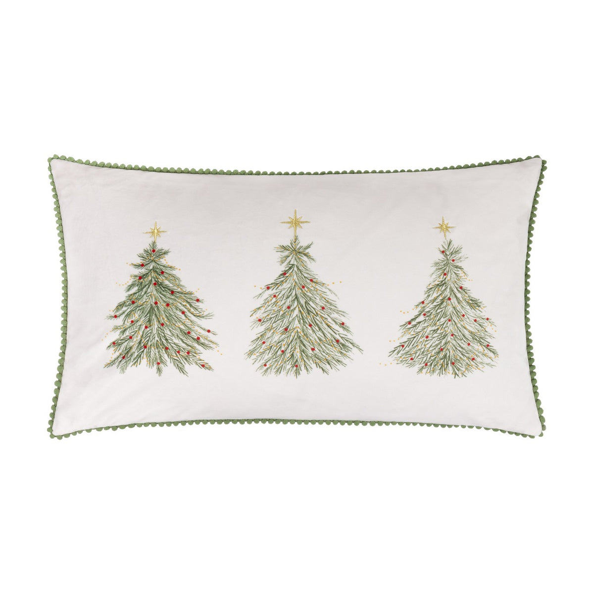 Rectangular cream velvet cushion embroidered with three green Christmas trees with red berries and gold stars, edged in green pompom trim, shown on a white background.