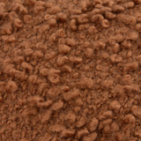 Close-up of the Ulsmere Wool Cotton Cushion in Ginger, showing dense, curly boucle-textured yarn in a warm ginger-brown finish.