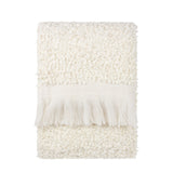 Folded Ulsmere Reversible Wool Throw in ecru, showing oversized bouclé texture with a smooth fringed border, on a plain white background.