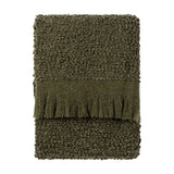 Ulsmere Reversible Wool Throw in Lichen, folded to show its bouclé texture with a fringed edge, in green tones on a plain white background.