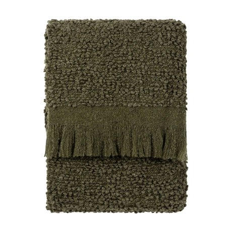 Ulsmere Reversible Wool Throw in Lichen, folded to show its bouclé texture with a fringed edge, in green tones on a plain white background.