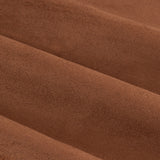 Close-up of Verso Blackout Eyelet Curtains in cinnamon, showing soft velvety polyester fabric folds in a deep russet brown.