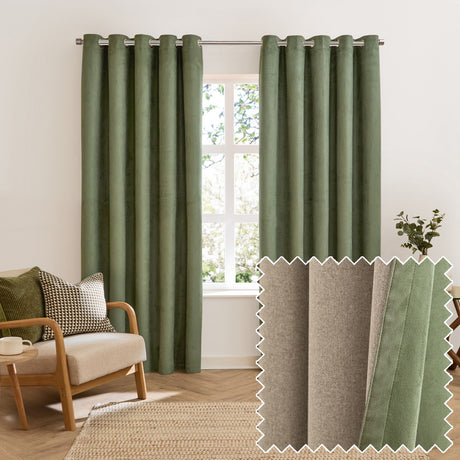 Green suede-effect reversible eyelet curtains on a metal rail beside a window in a living room with an armchair, swatch inset showing the beige reverse side.