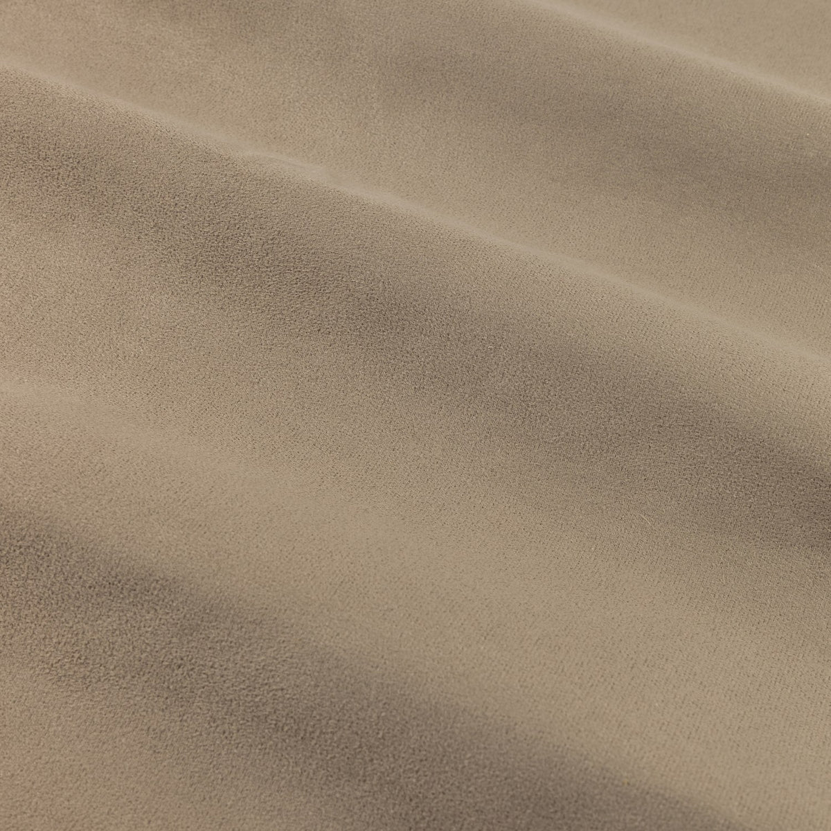 Close-up of the Verso Plain Reversible Eyelet Curtains in mocha, showing the soft suede-effect polyester fabric with gentle folds and subtle sheen.