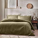 Waffle Cotton Plain Duvet Cover Set in Olive, textured cotton bedding with matching pillowcases on a bed in a neutral bedroom setting.