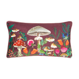 Rectangular velvet bolster cushion in deep wine-red, printed with a hand-painted mushroom and floral garden design in multicolour tones, shown on a plain white background.
