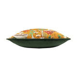 Side view of the Wildgarden Mushroom polyester cushion, showing an amber-gold woodland print with mushrooms and ferns on one side and a plain green velvet reverse, set on a white background.