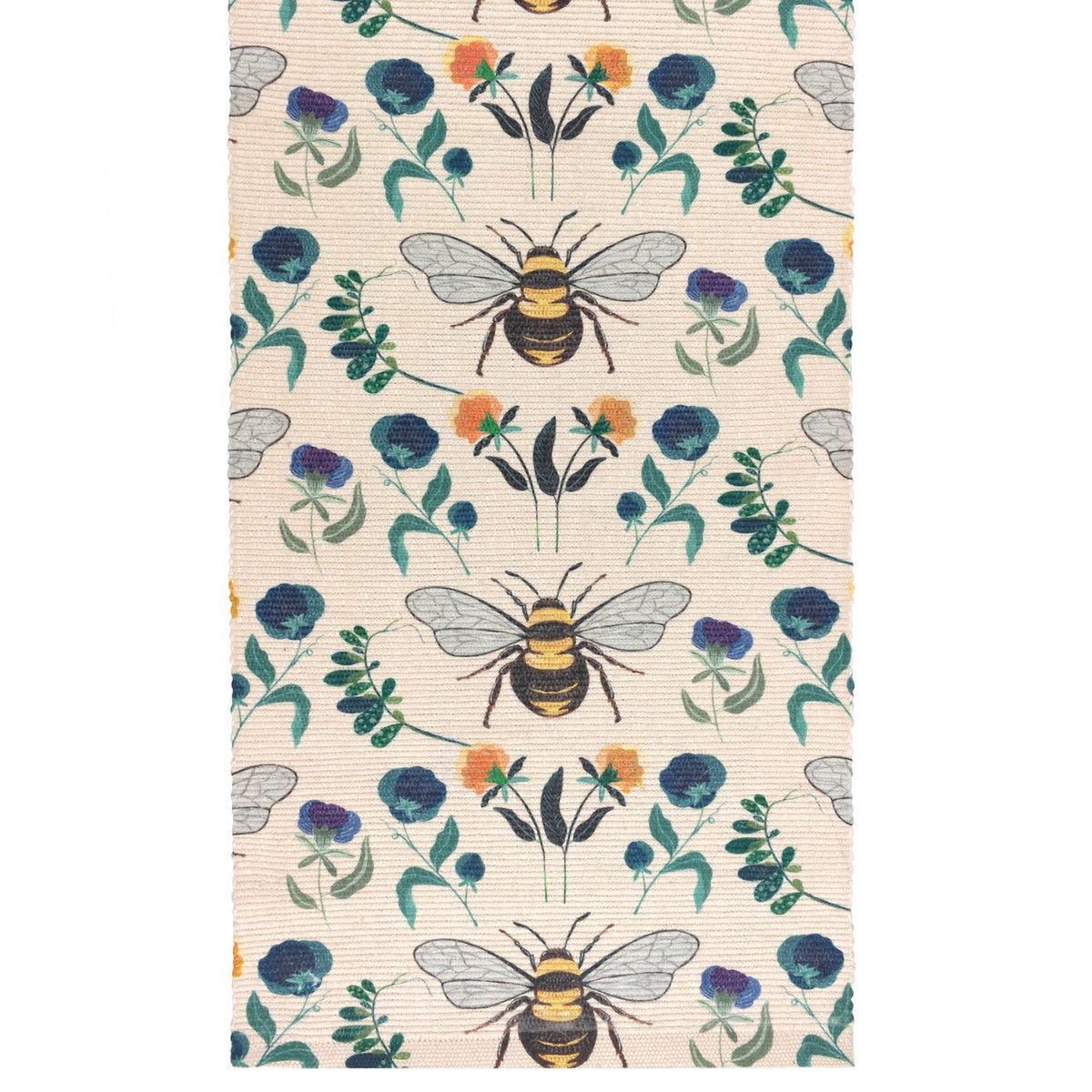 Wild Garden polyester table runner in cream, woven with large bumblebees, blue and purple blooms, orange flowers and green foliage in a repeating multicolour pattern.