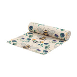 Wild Garden Animal Polyester Table Runner, partially rolled, showing bumblebees and blue, purple, and orange florals with green foliage on a cream ground, plain white background.