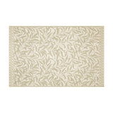 Willow Boughs cotton bath mat in natural, featuring a sandy beige trailing leaf pattern with a dotted border on off-white ground, shown on a plain white background.