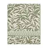 Folded Willow Boughs jacquard cotton towel in sage green with a trailing willow leaf pattern and striped border, shown on a plain white background.