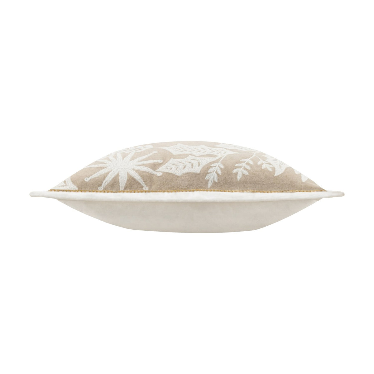 Side view of the Winter Warmest Wishes velvet cotton cushion in natural beige, showing raised white embroidered snowflake and leaf motifs and a plain cream reverse, against a white background.