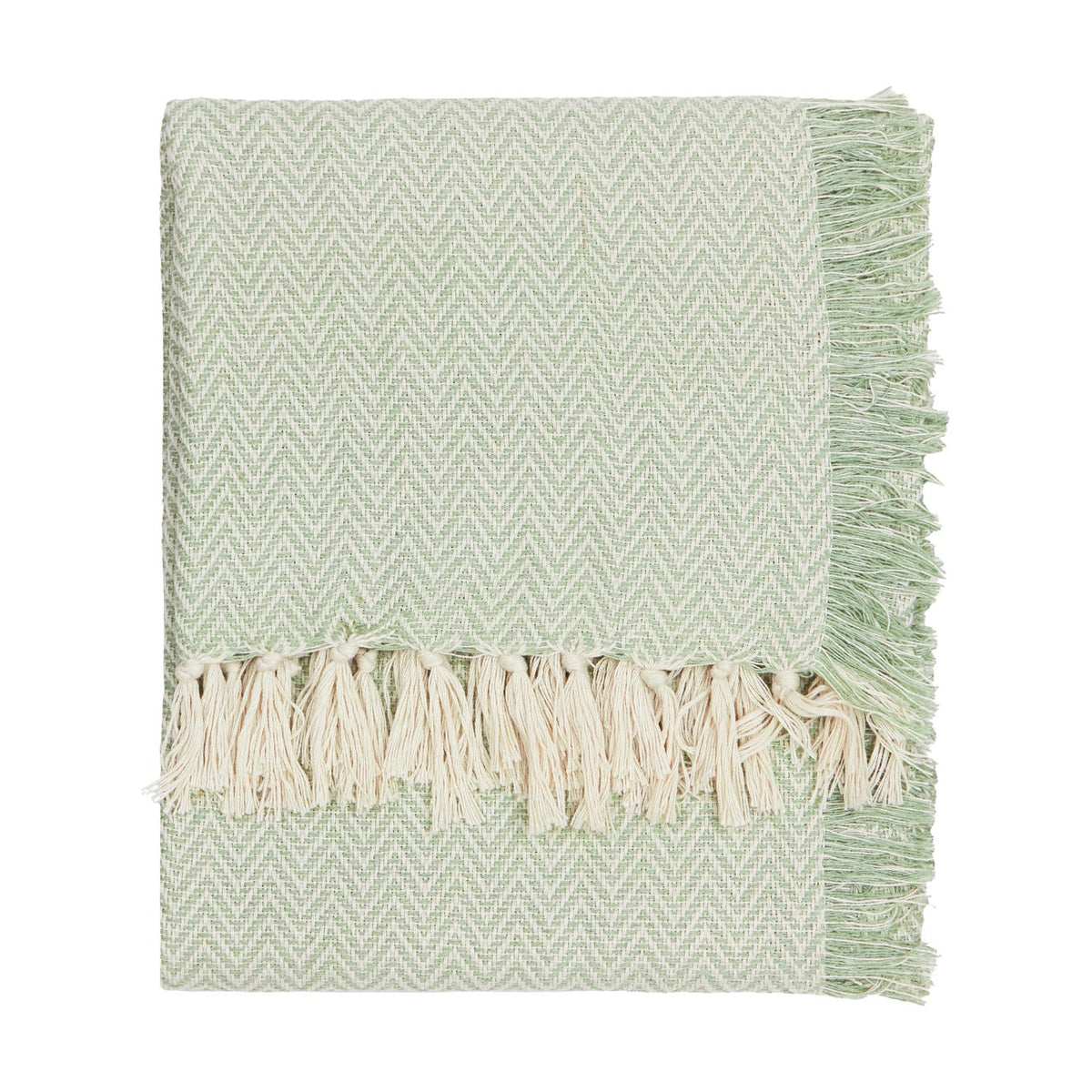 Wisley Herringbone Polyester Throw in leaf green, folded to show chevron weave texture and cream knotted tassel fringe, on a plain white background.