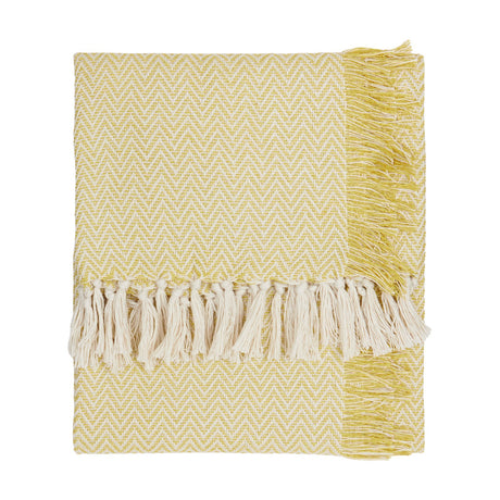 Wisley Herringbone Polyester Throw in yellow and cream, folded with knotted fringe tassels, shown against a plain white background.