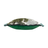 Side view of the Woodlands Eyelet Velvet Cushion in green, showing a woven woodland tree jacquard front, green velvet back, and teal fringe trim on a white background.