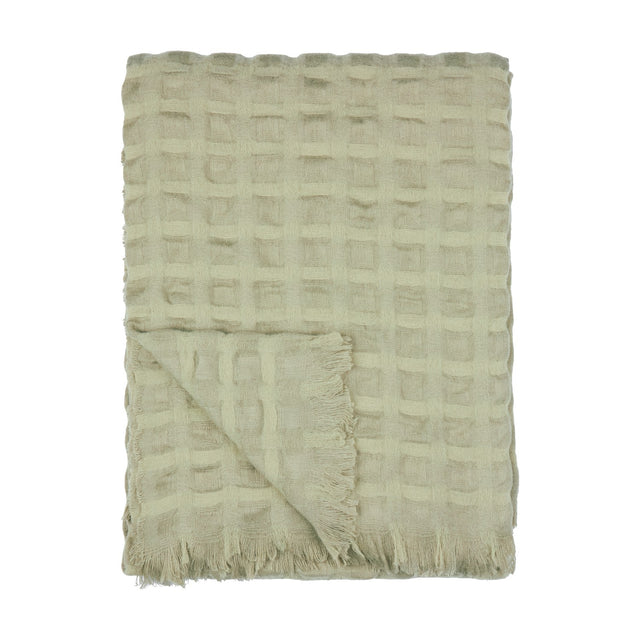 Walton Waffle Check Polyester Throw in sage, folded to show its textured grid weave and fringed edge trim against a plain white background.