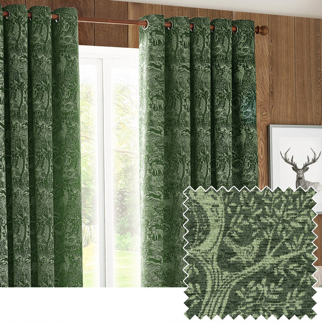 Winter Woods Chenille Lined Eyelet Curtains in emerald, hung on a copper pole beside a window, showing a tonal woodland jacquard of deer and trees, with a fabric swatch inset.