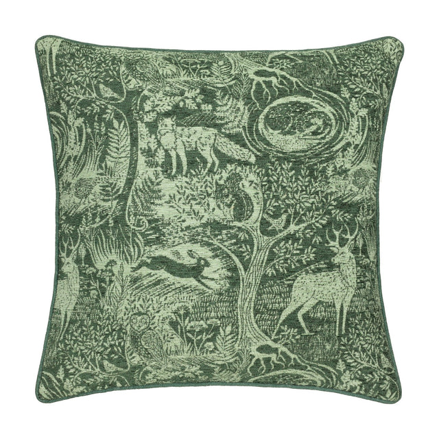 Winter Woods Jacquard Chenille Cushion in emerald green, a square design woven with forest animals including a fox, hare, stag and squirrel among trees and ferns, shown on a white background.
