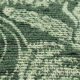Close-up of the Winter Woods Jacquard Chenille Cushion in emerald, showing a woven two-tone forest scene of deer, hare, and branching trees in the textured fabric.