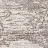 Close-up of the Winter Woods Jacquard Chenille Cushion in taupe, showing the raised woodland pattern woven into the textured fabric.