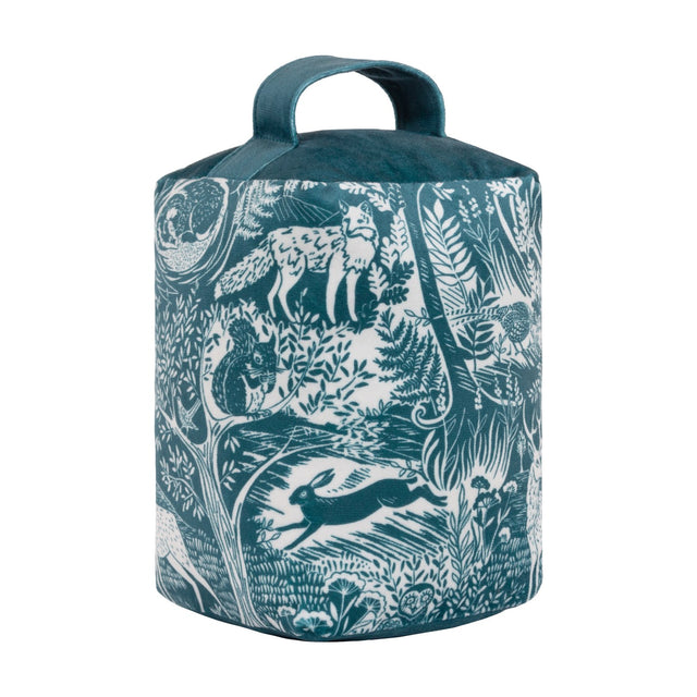 Winter Woods Animal Velvet Door Stop in midnight blue, cylindrical with fabric handle, featuring a cream woodblock-style print of a fox, hare, and squirrel among ferns, on a white background.