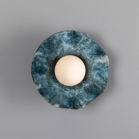 Rivale Ceramic Globe Wall Light IP44 in Blue Earth, a round mottled blue ceramic dish with rippled edge surrounding a central opal glass globe, on a light grey background.
