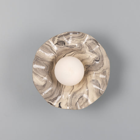 Rivale Ceramic Globe Wall Light with marbled grey and cream glaze surround and central white glass globe, shown from above on a plain grey background.