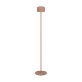 Roccanova-L solar LED floor lamp in terracotta steel, with a drum-shaped head, slim stem and round disc base, shown on a plain white background.