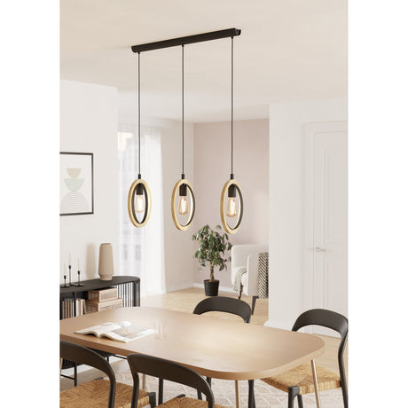 Rolmanne Linear Pendant Light in black and brown, three open wood and black ring pendants on a black ceiling bar with E27 bulbs, shown above a dining table.