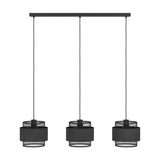 Ronarne linear pendant light with black ceiling bar and three black fabric drum shades layered between diamond-mesh tiers, black steel frame, on a white background.