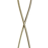 The Rosa Del Desierto 2 Light Floor Lamp in Antique Brass features two slim metallic rods crossed in an “X” shape, creating a minimalist yet striking statement piece ideal for elegant interiors.