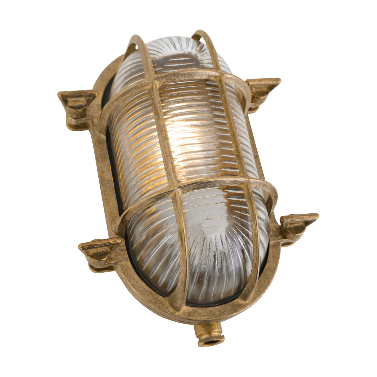 Ruben Small Bulkhead wall light in brass with an oval ribbed glass shade, cage guard, and four fixing lugs, shown on a plain white background.