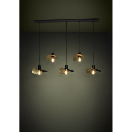 Saceda Linear Pendant Light in black and gold, with five hat-shaped steel shades at staggered heights along a black ceiling bar, each shade's gold-lined underside catching the bulb glow.