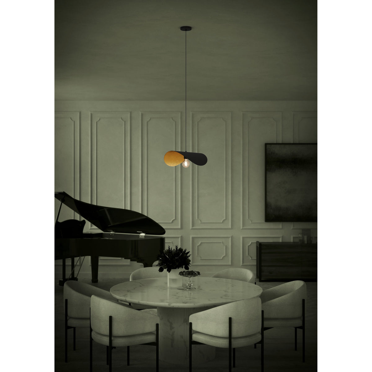 Saceda Pendant Light 53cm in black and gold steel, single curved disc shade over a bulb, hung above a dining table in a panelled room.