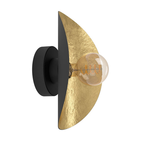Saceda Wall Light in black and gold, round black backplate with a curved steel shade, black outside and hammered gold inside, fitted with a single exposed E27 bulb on a plain white background.
