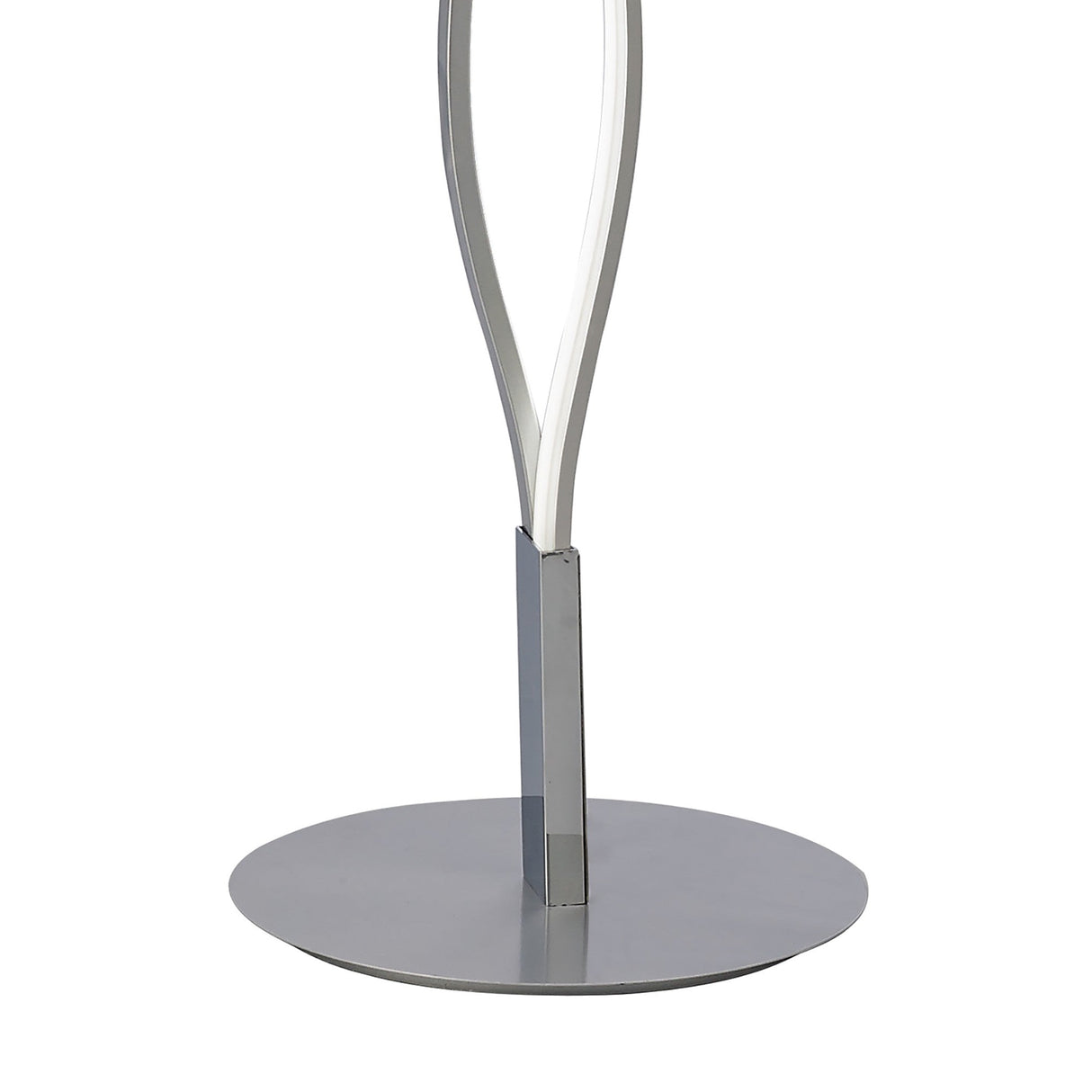 A close-up of the Sahara LED Floor Lamp 21W 3000K in Silver & Chrome features a round, flat base with two sleek, curved metal rods—an elegant choice for adding ambient lighting to any room.